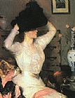 Frank Weston Benson Canvas Paintings - Lady Trying On a Hat
